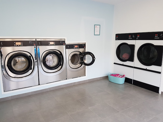 Bugaderia - Laundry - Lavandería Net i Eixut